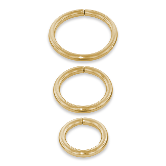 Our three sizes of 16 gauge 18 karat gold seam rings, all in yellow gold