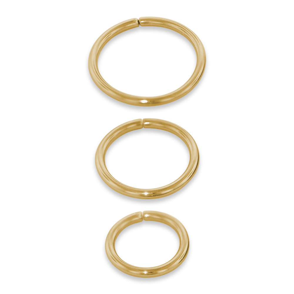 Our three sizes of 18 gauge 18 karat gold seam rings, all in yellow gold