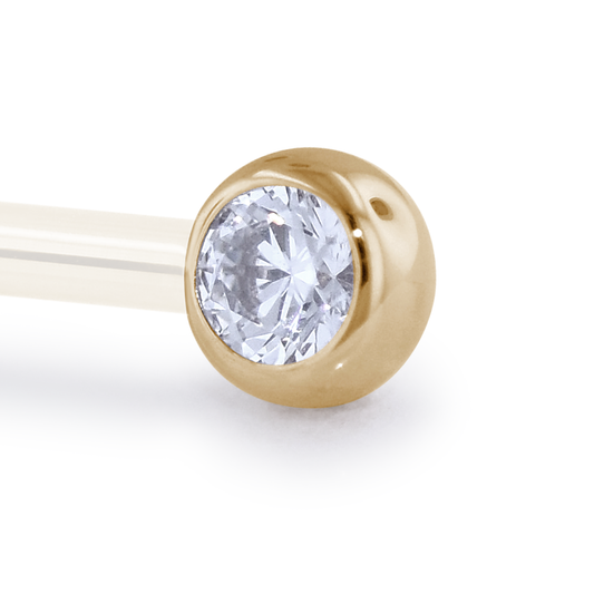 A 12 Gauge side gem in Yellow Gold with a Cubic Zirconia Gem