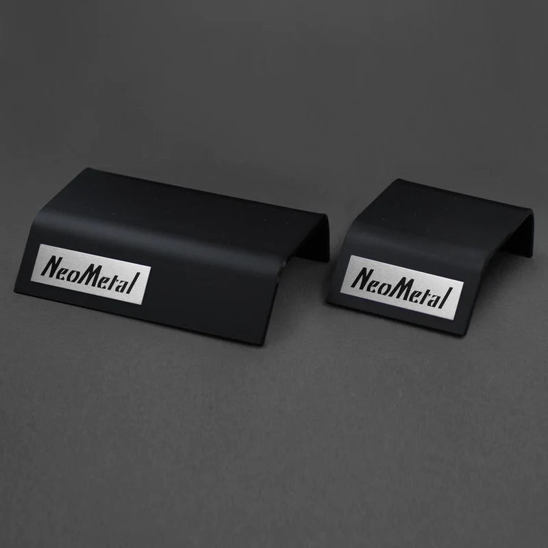 A 40 piece black acrylic display case with the NeoMetal logo and a 20 piece black acrylic display case with the NeoMetal logo.