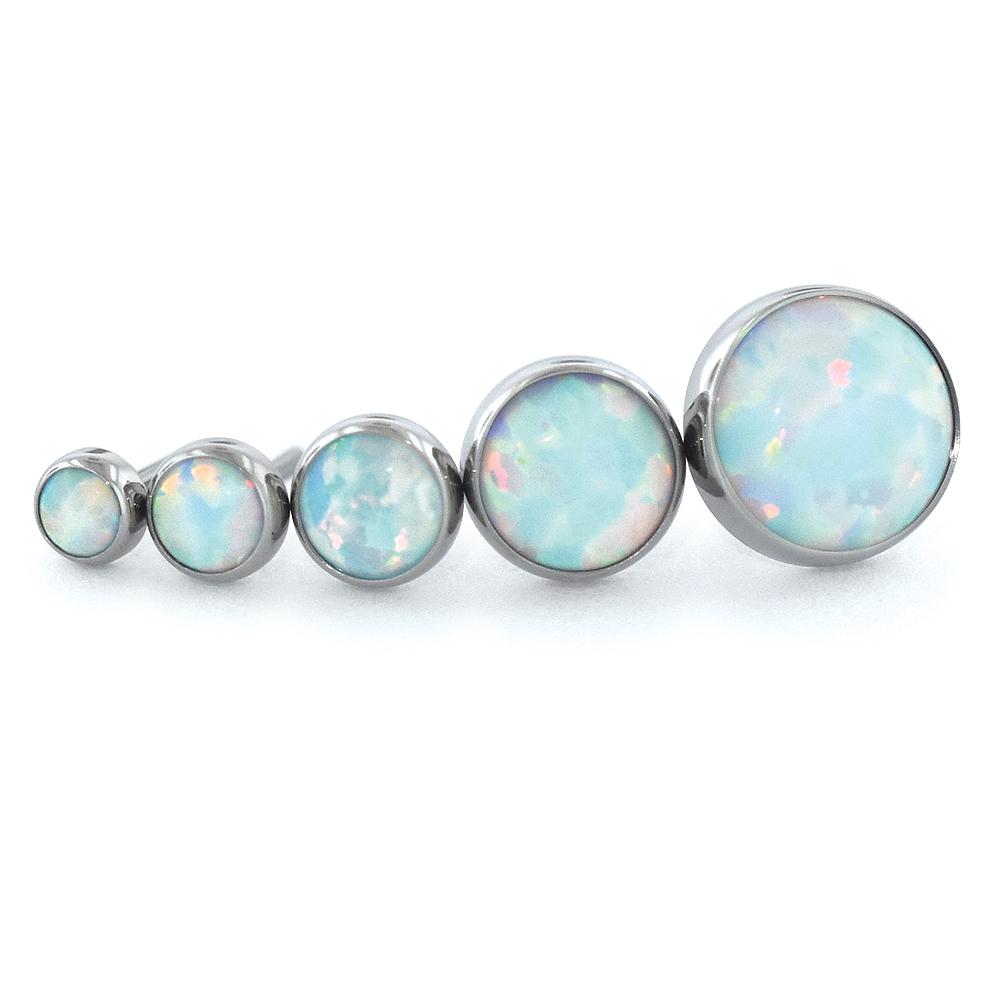 Five sizes of threadless titanium gem ends with white opal cabochon gems