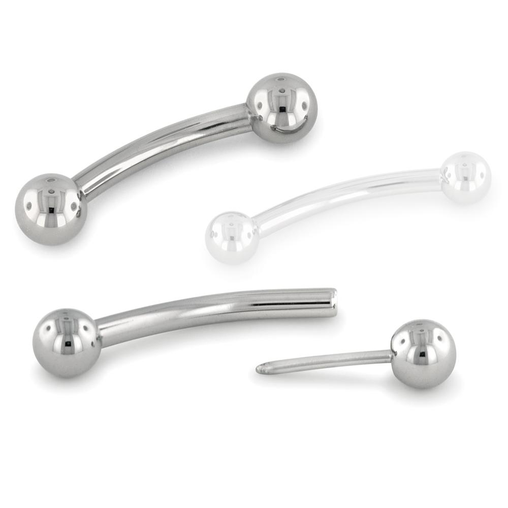 A threadless titanium curved barbell with two ball ends inserted and a threadless titanium curved barbell with one ball end removed.