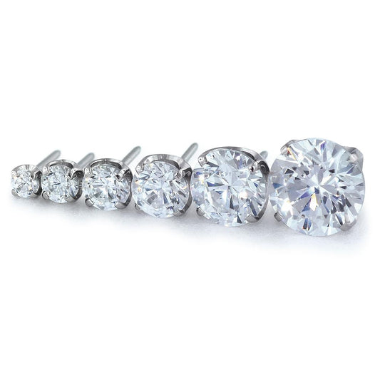 Six sizes of threadless titanium prong set gem ends with cubic zirconia gems.
